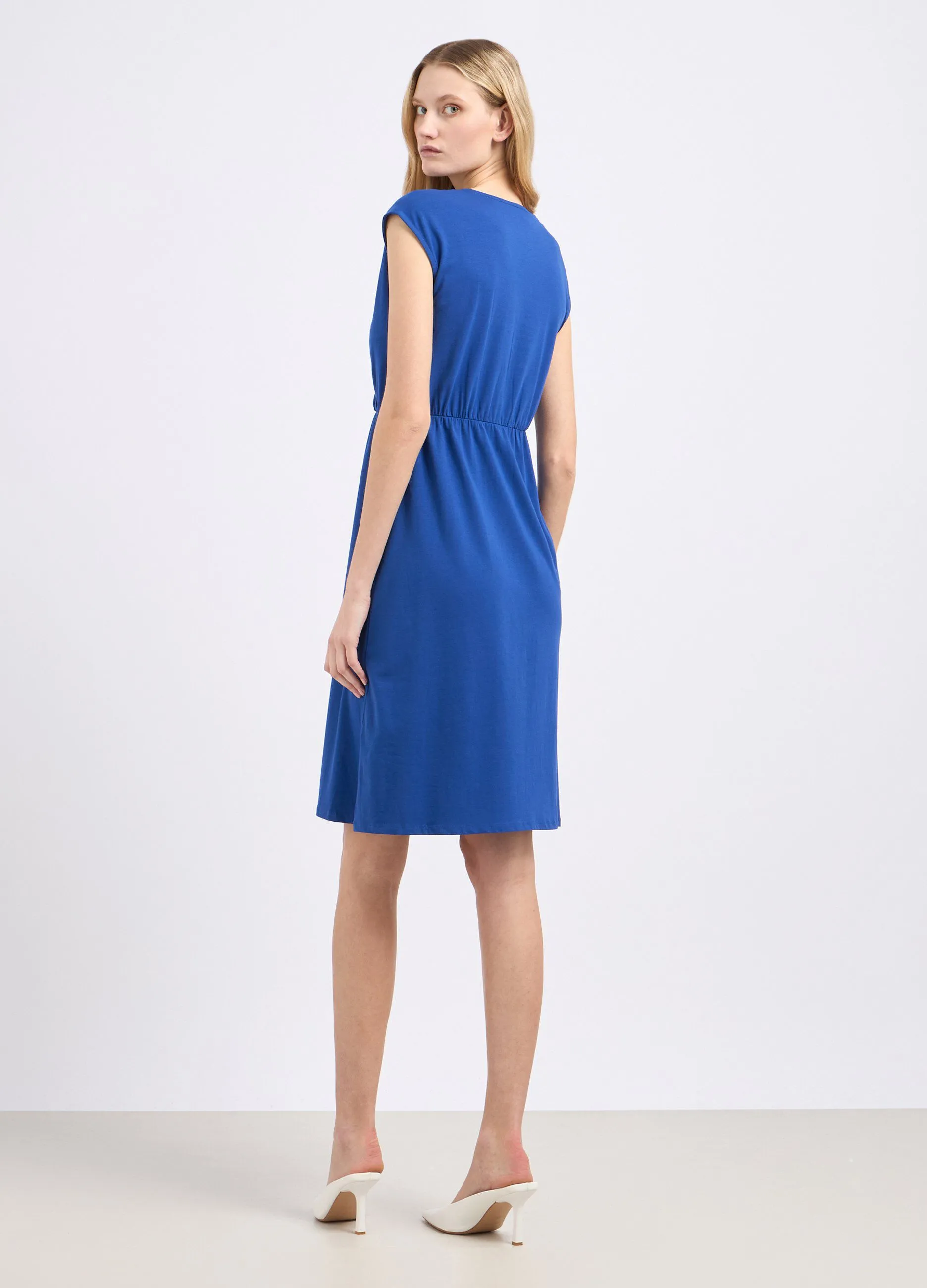 Abito smanicato in cotone stretch