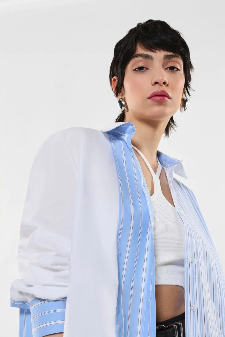 Camicia in cotone fantasia rigata con orlo asimmetrico