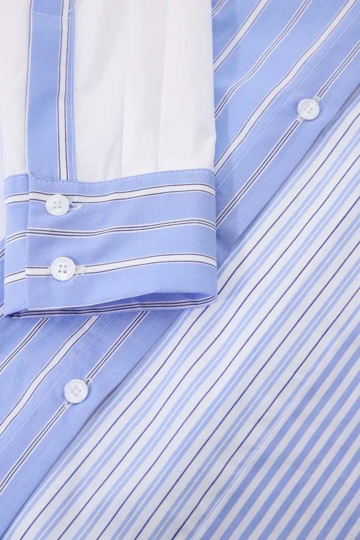 Camicia in cotone fantasia rigata con orlo asimmetrico
