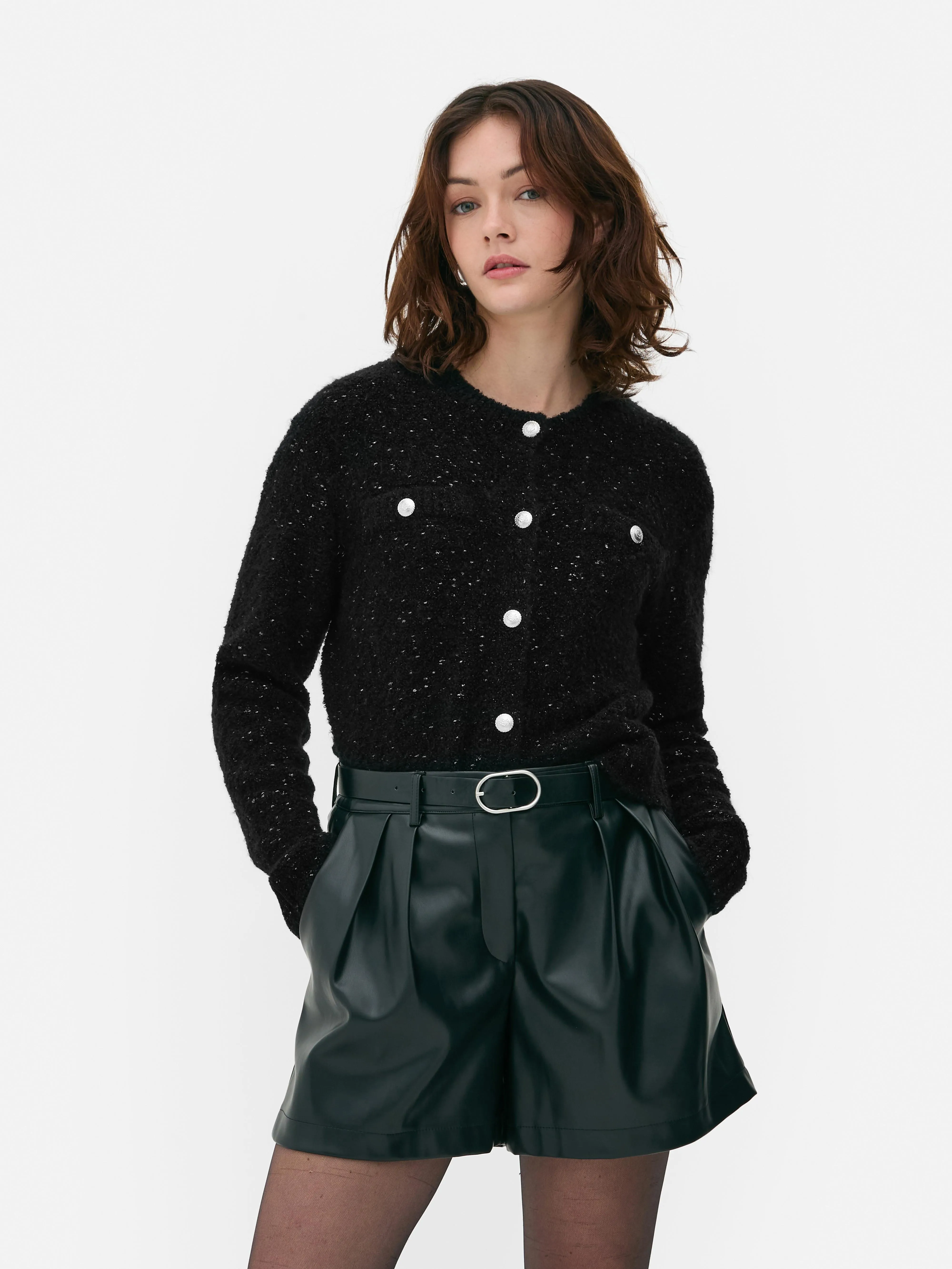 Cardigan scintillante con bottoni