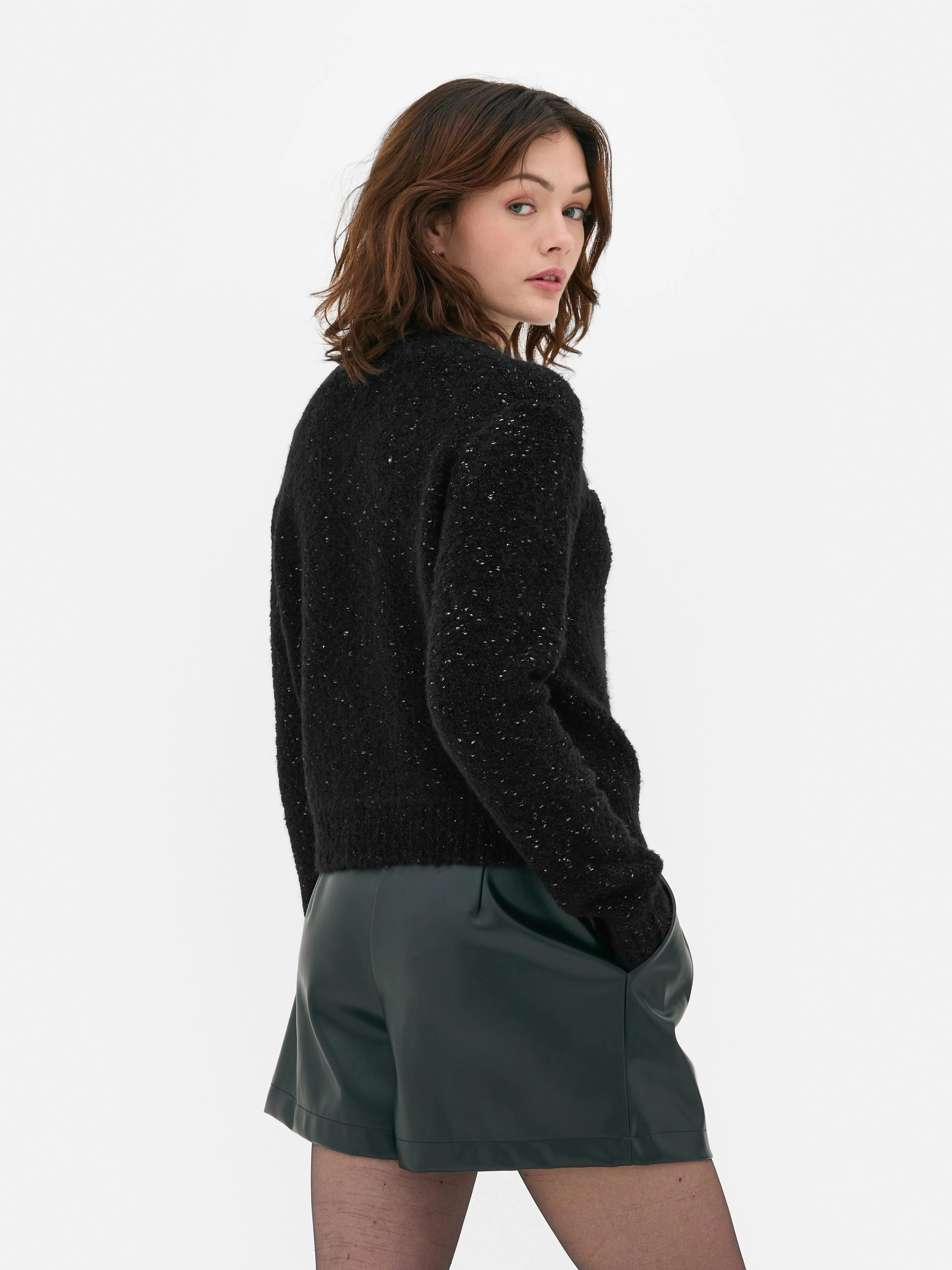 Cardigan scintillante con bottoni