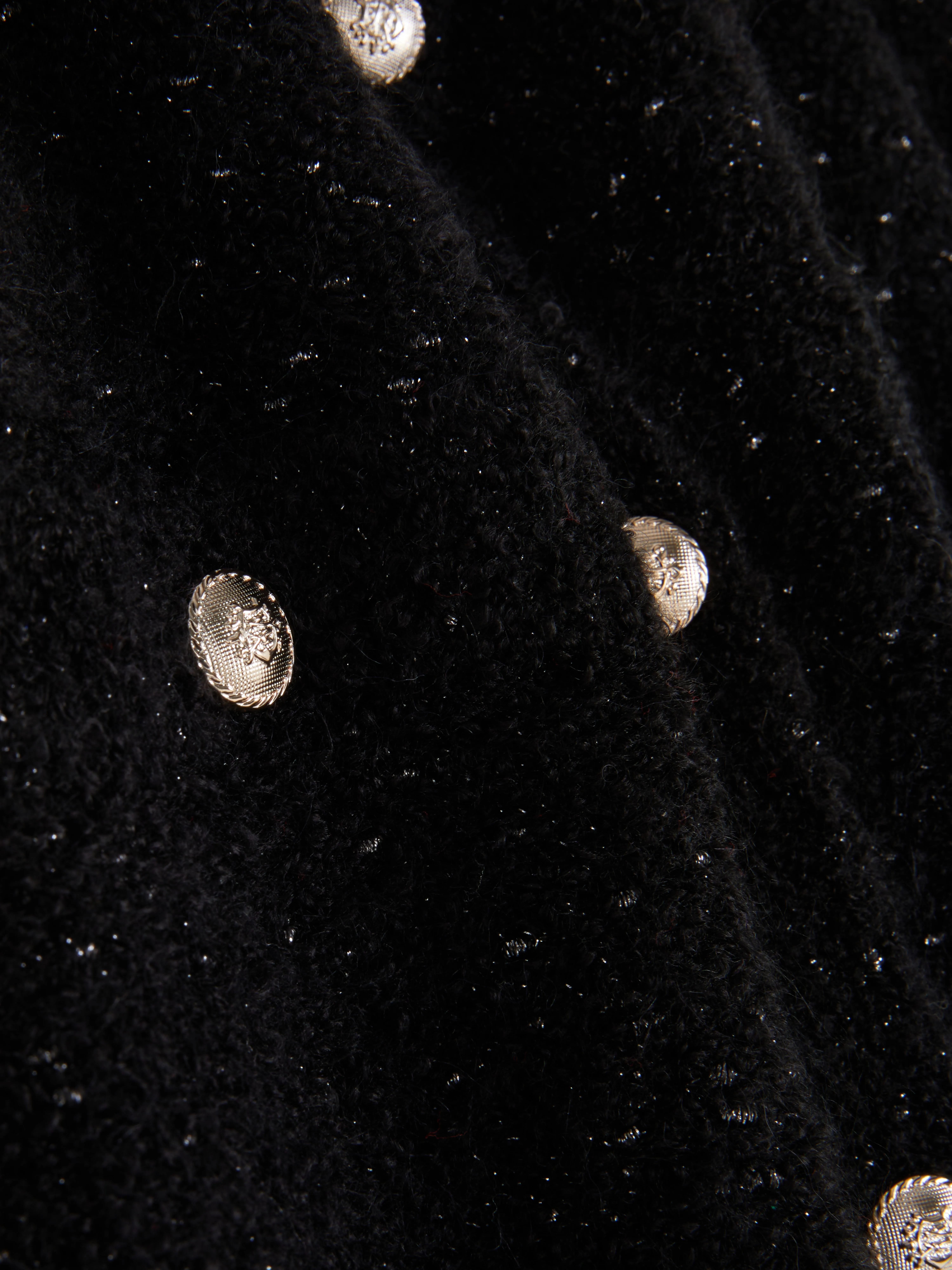Cardigan scintillante con bottoni