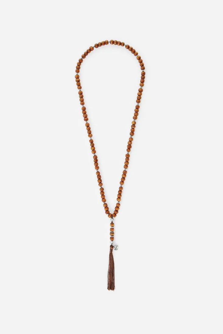 Collana con pietre colorate e nappa pendente