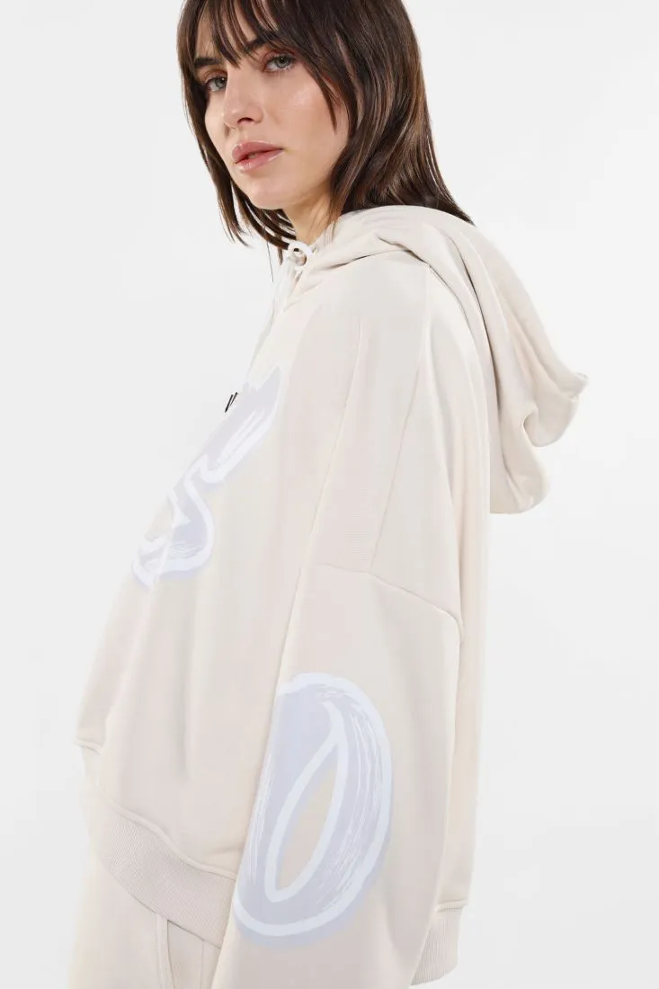 Felpa oversize fantasia stampata con cappuccio e coulisse
