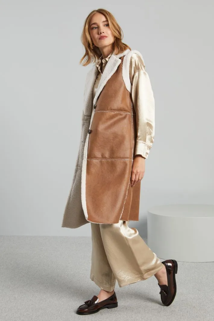 Gilet lungo con bottoni