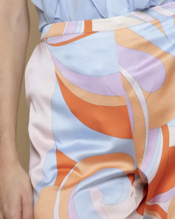 Pantaloni palazzo in raso a fantasia geometrica azzurra, arancione rosa