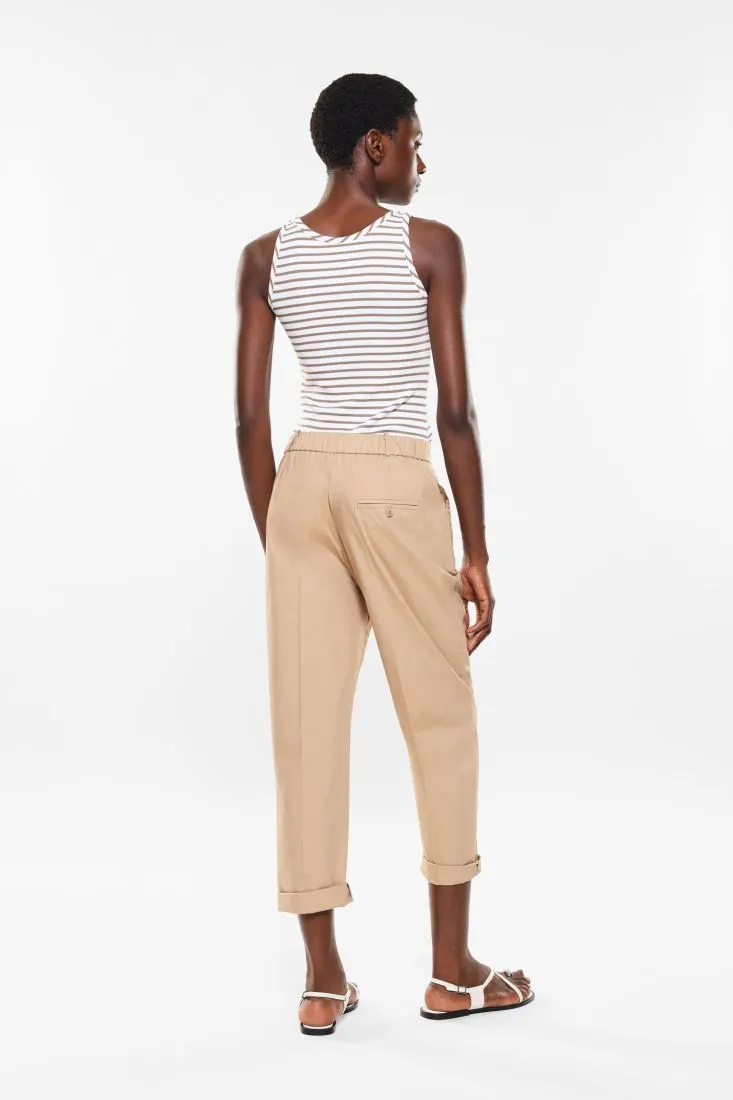 Pantaloni slim-fit cropped in puro cotone con piega stirata