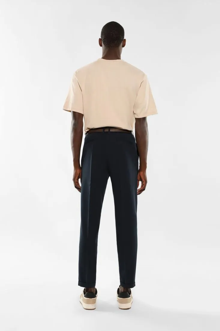 Pantaloni slim-fit monocolour con piega stirata