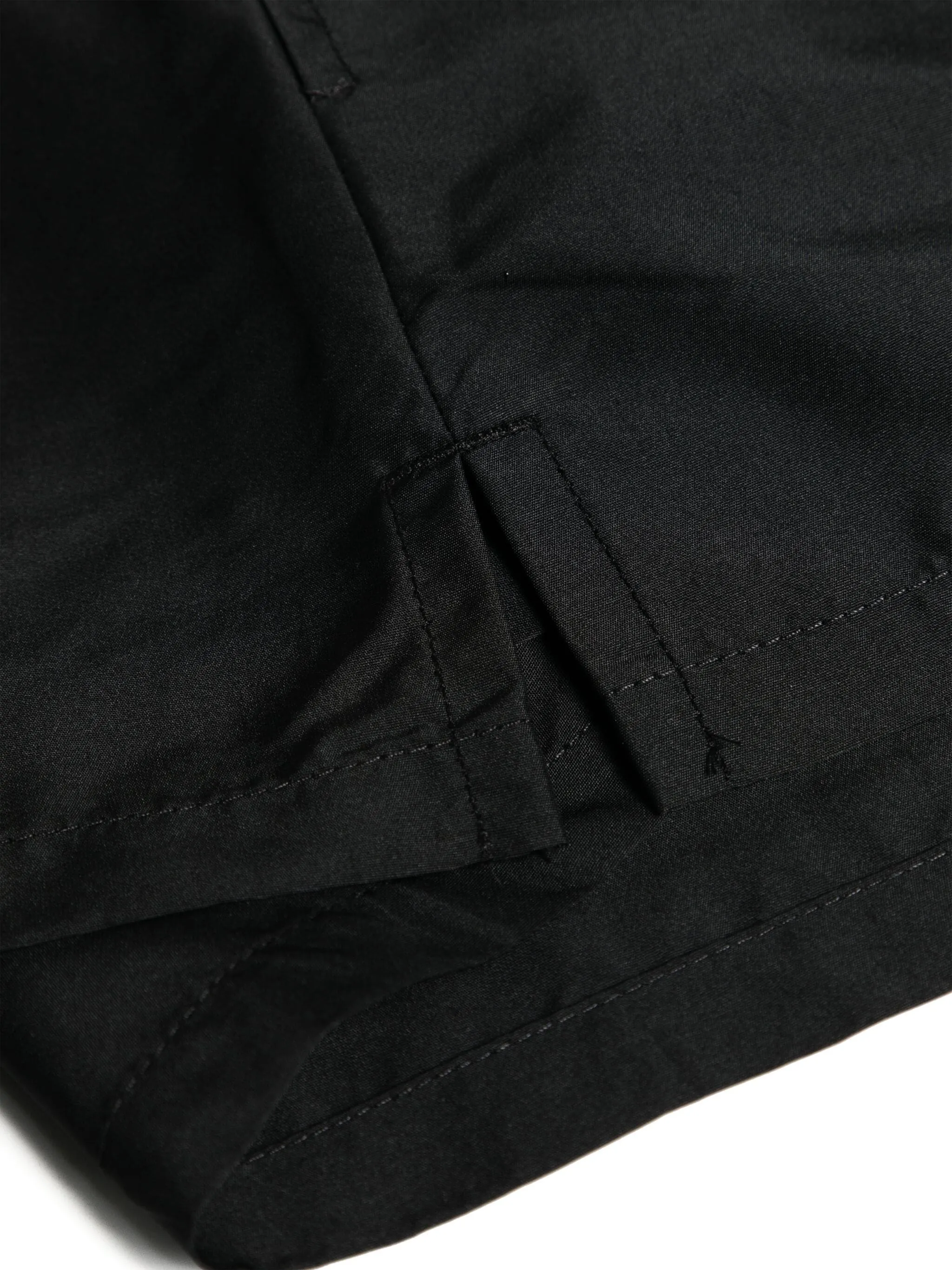 Shorts Versace con bordo greco