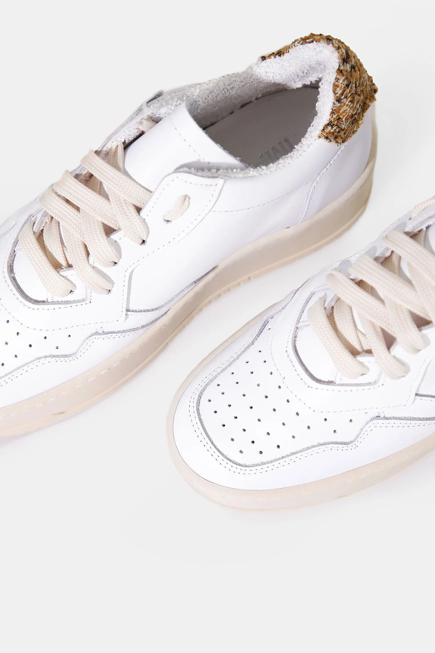  Sneakers con zeppa e dettaglio posteriore     
