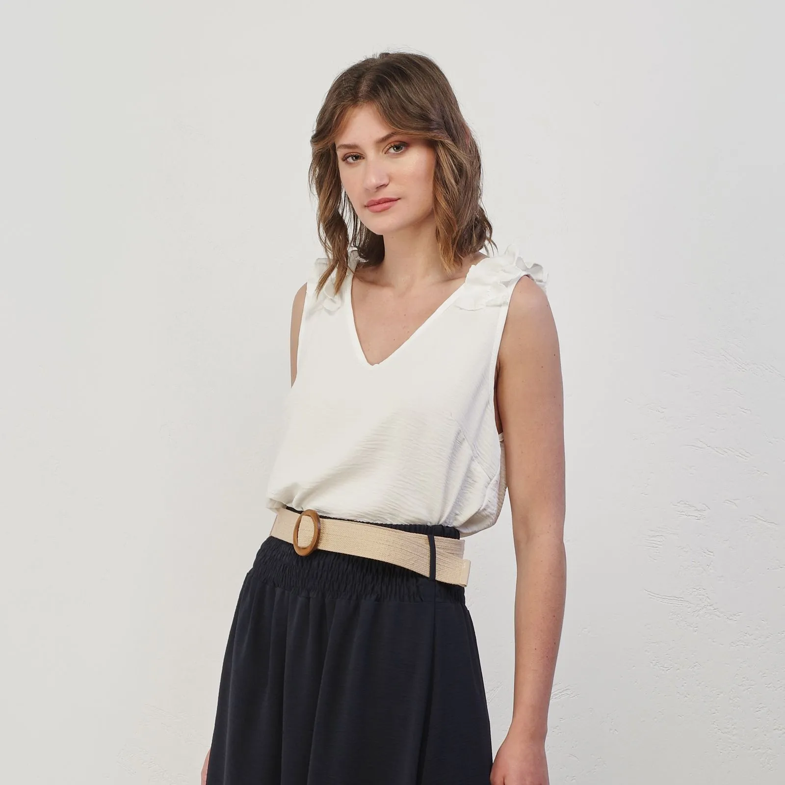 Top bianco smanicato con rouges