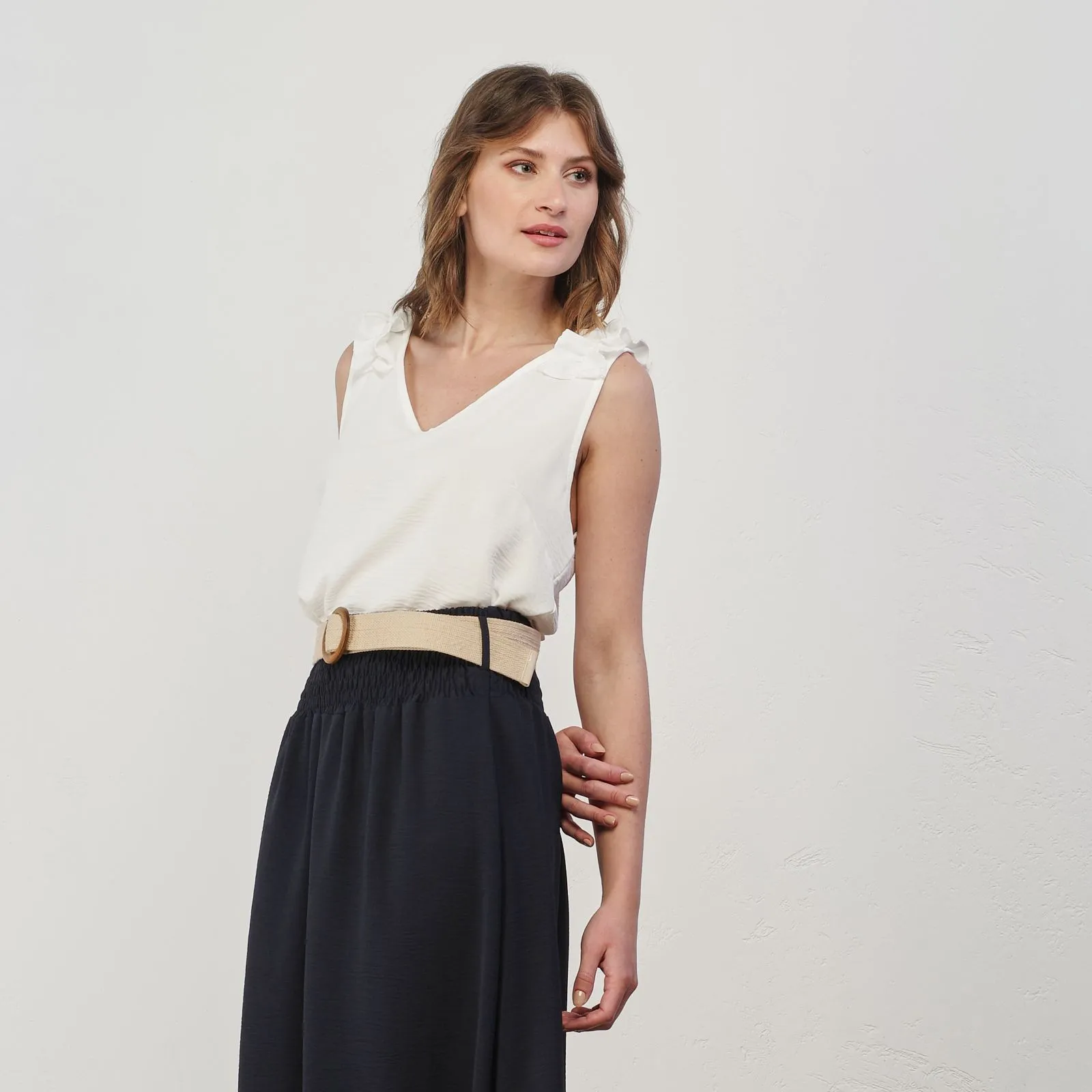Top bianco smanicato con rouges