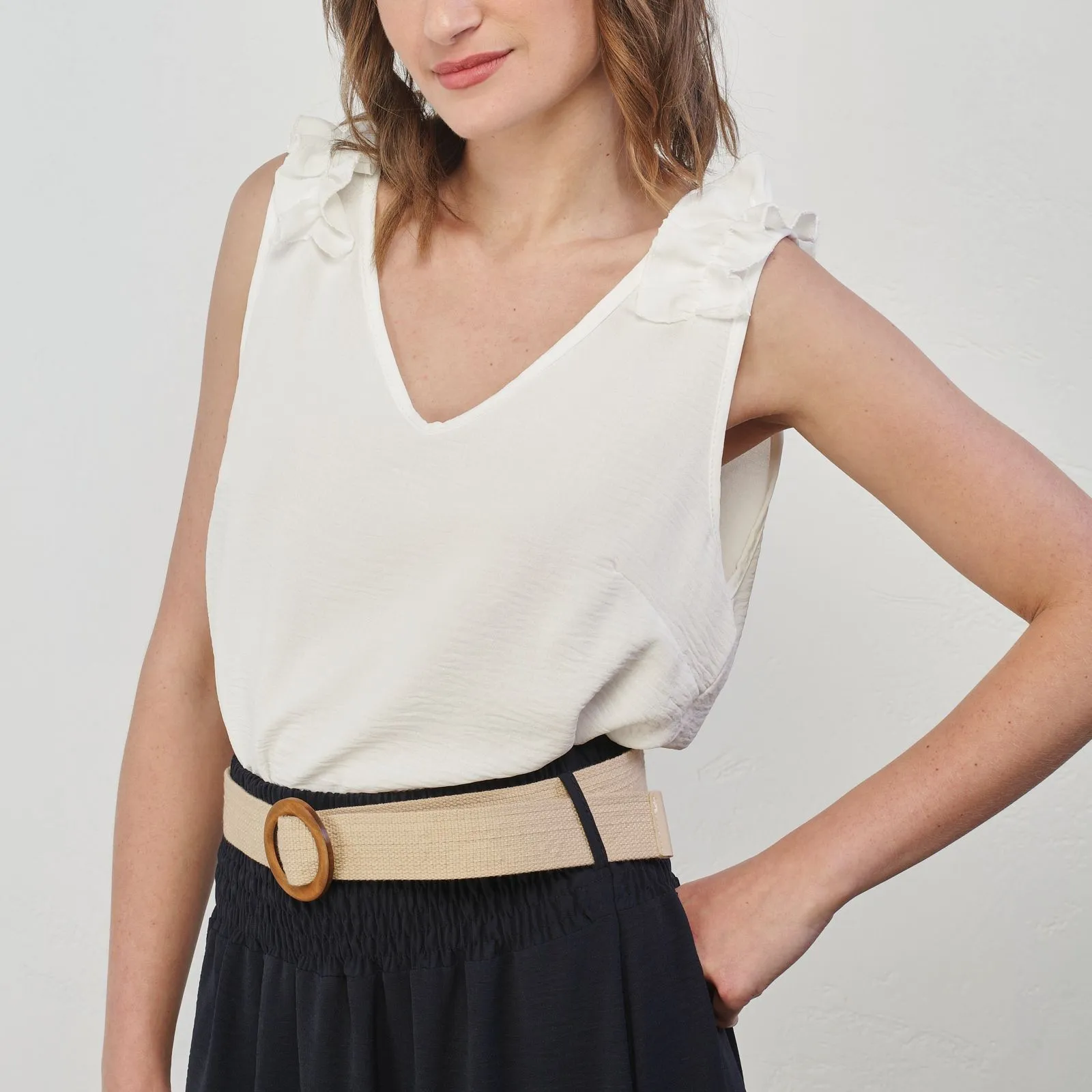 Top bianco smanicato con rouges