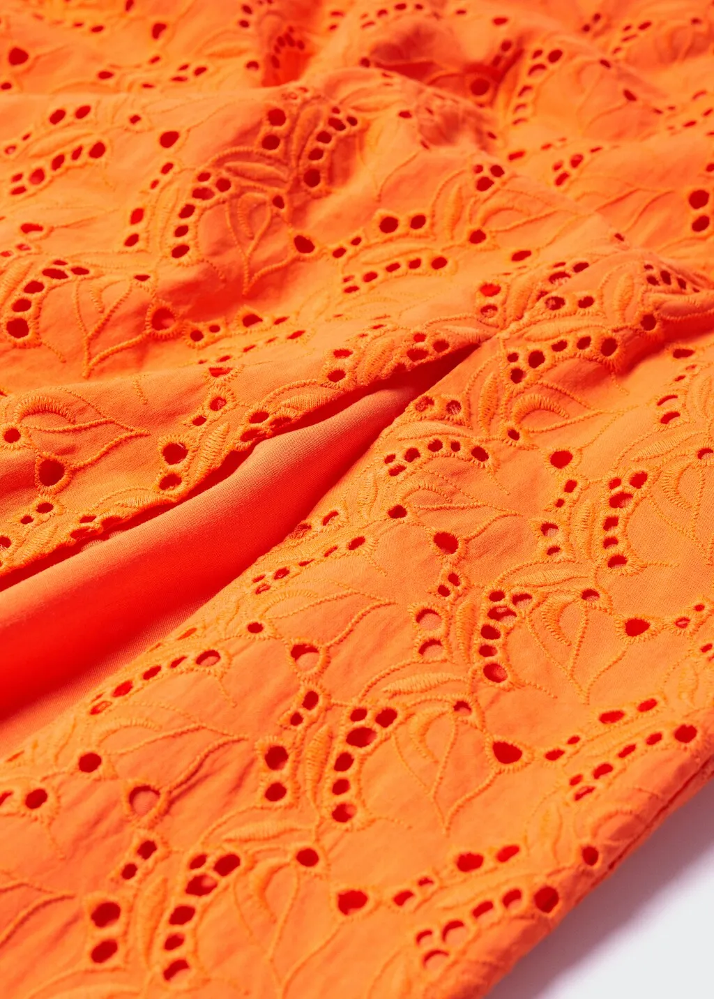 Vestito traforato spacco